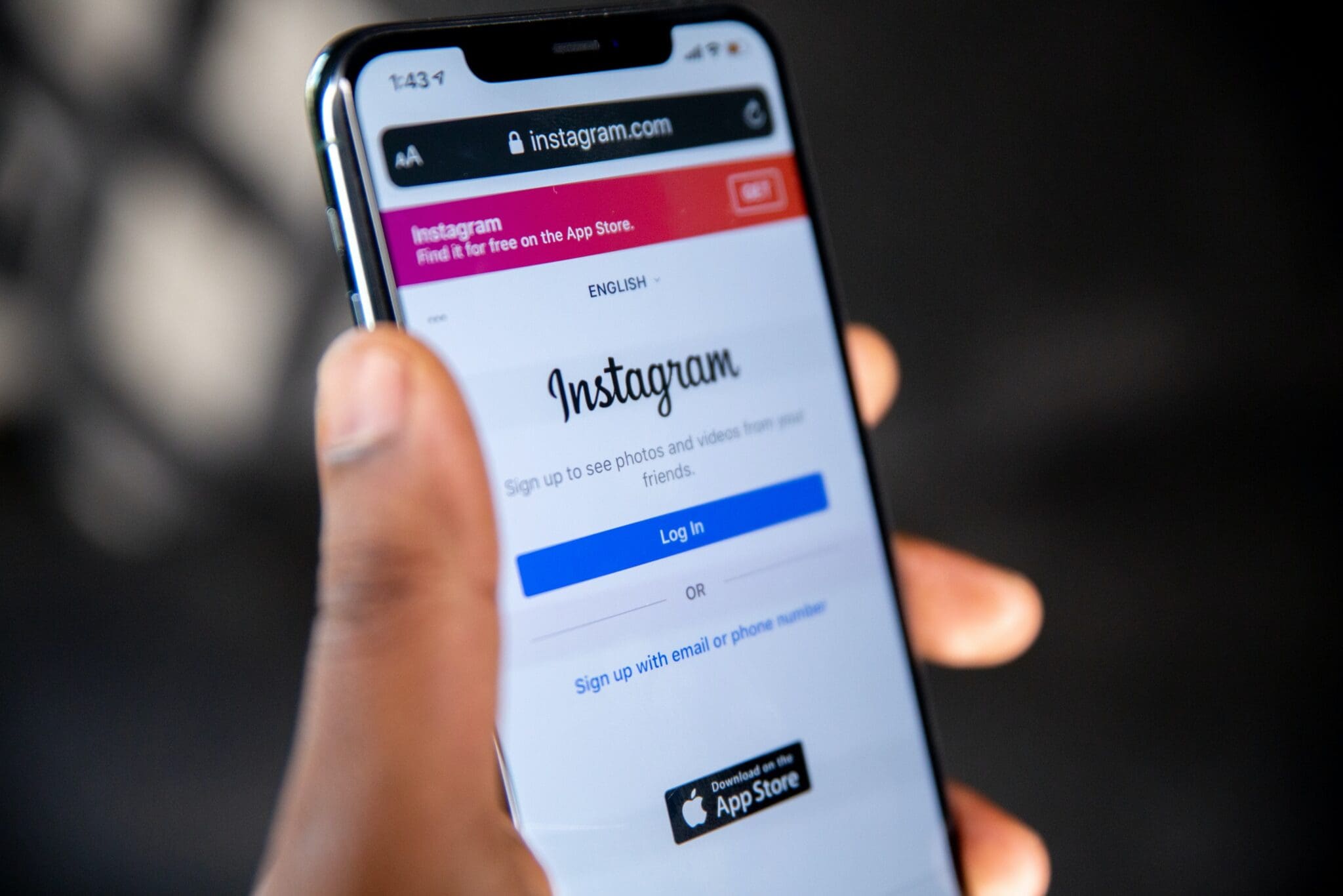 Person logging in to Instagram